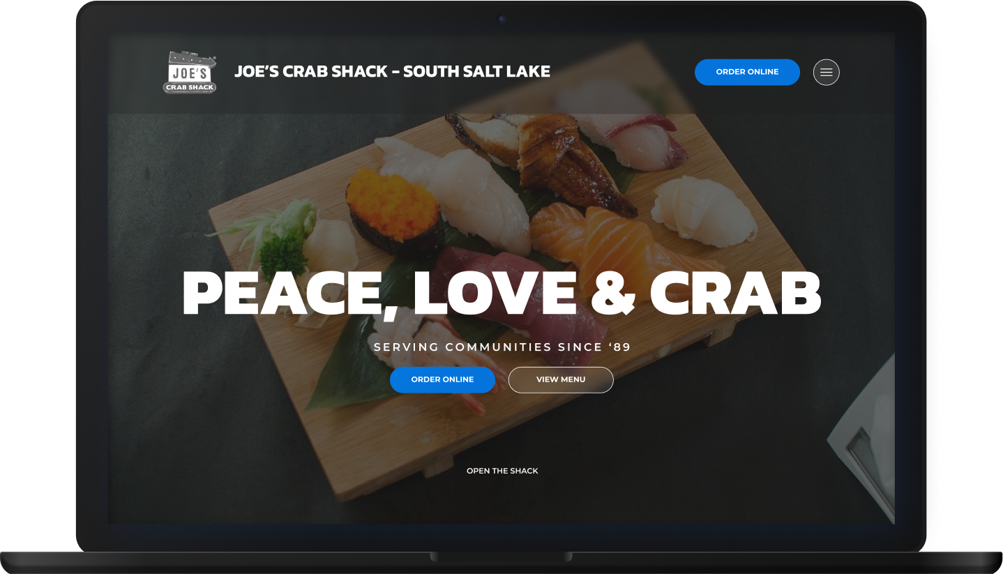 Joe's Crab Shack restaurant webpage with sushi, promoting 'PEACE, LOVE & CRAB' motto