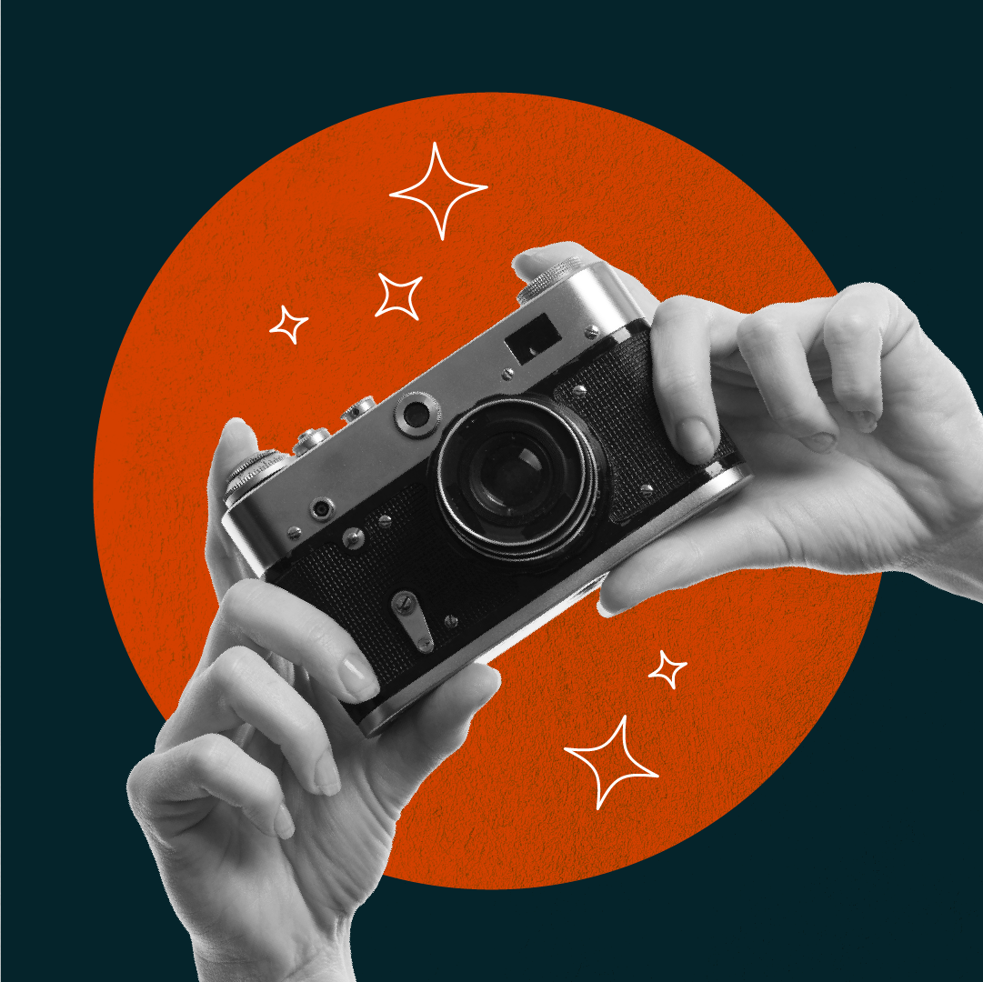 Hands holding a camera symbolizing how high-quality food photography increases restaurant online orders